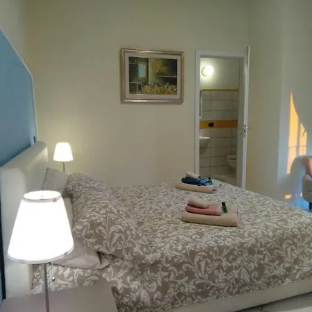 Couette-café Rosa Angrisano
