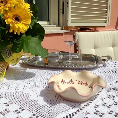 Rosa Angrisano Couette-café